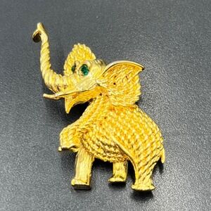 Gold Tone Elephant Pin Brooch
Green Rhinestones Eyes Trunk Up
Animal Figural Pin